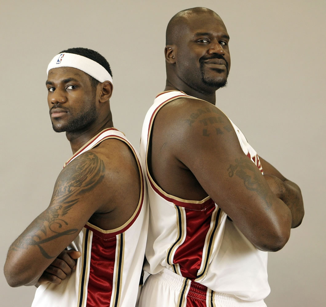 Cleveland Cavaliers' LeBron James, left, and Shaquille O'Neal pose for a portrait during NBA basketball media day on Saturday, Oct. 3, 2009, in Independence, Ohio.