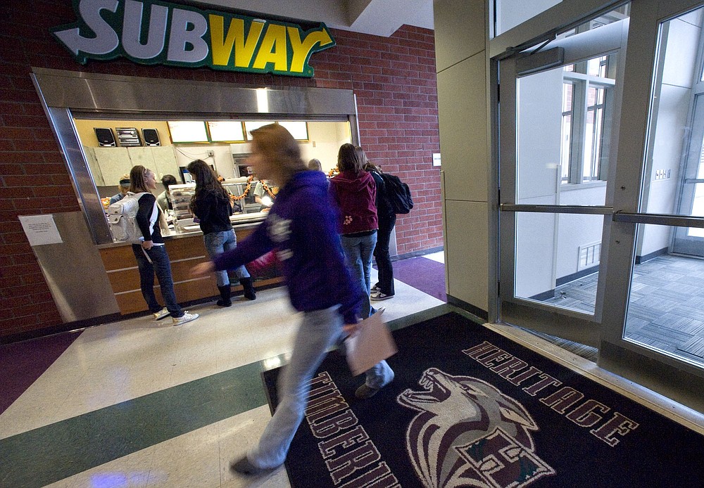 Zachary Kaufman/The Columbian
Heritage High School students line up at the new Subway sandwich shop on campus. Five Evergreen district middle and high schools have full-blown Subway shops this fall. Other Evergreen schools may join them.
