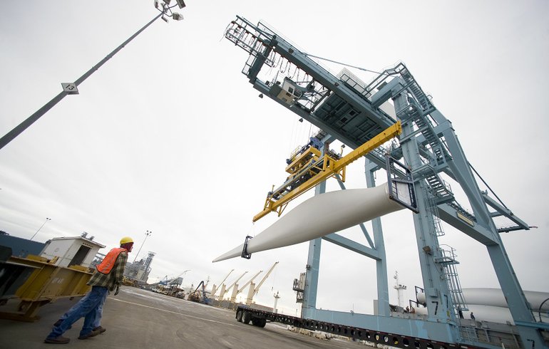 Wind turbine blades are unloaded at the Port of Vancouver.