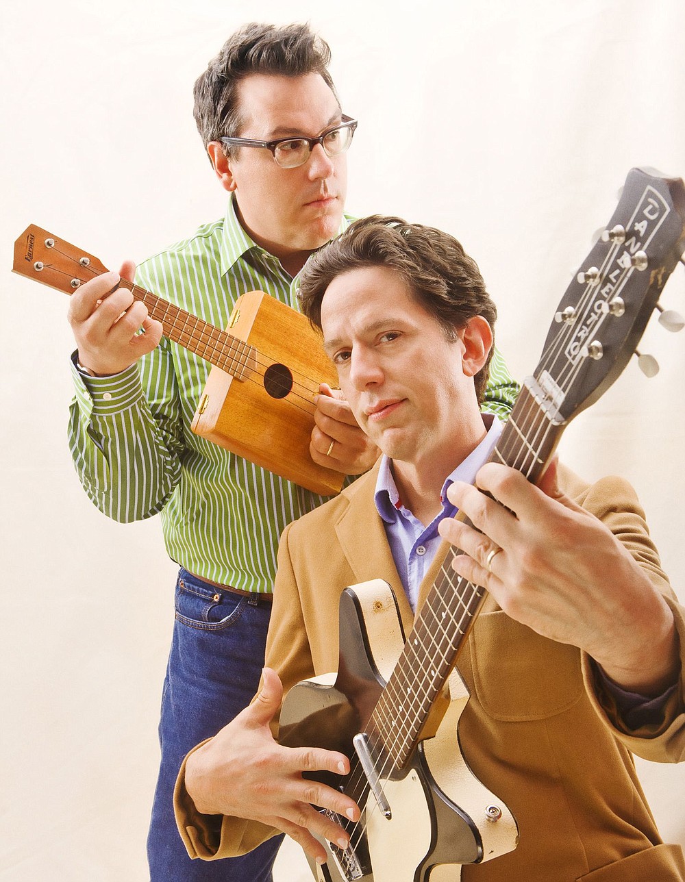 Jayme Thornton
They Might Be Giants' live shows are a departure from the duo's recorded music. John Linnell, foreground, and John Flansburgh will perform with an expanded band and will use an electronic drum kit that emits novel sounds.