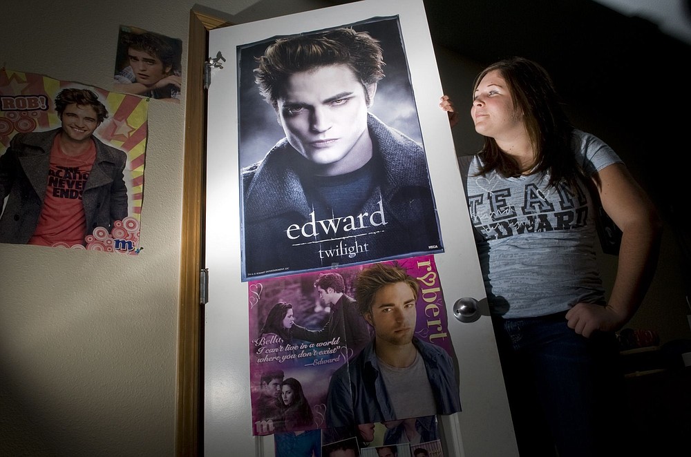 ZACHARY KAUFMAN/The Columbian
Nicole Pulicella, 15, shows her love of Edward Cullen with a Team Edward T-shirt. She has decorated her room with posters of the &quot;vegetarian vampire,&quot; portrayed by British actor Robert Pattinson.