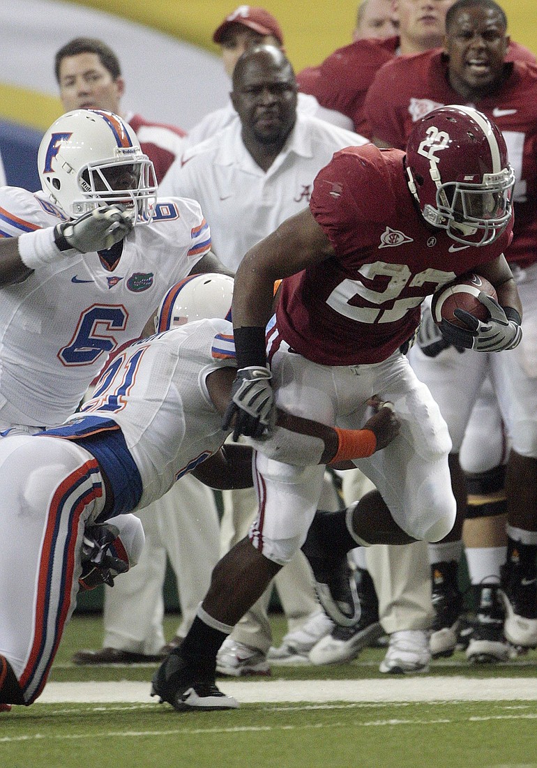 dave martin/The Associated Press
Alabama's Mark Ingram (22) ran for 113 yards and three touchdowns in the win.