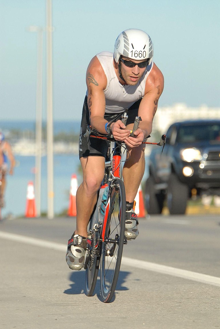 Josh Monda finished seventh in his age group and 37th among all amateurs at the half-Ironman triathon world championships.