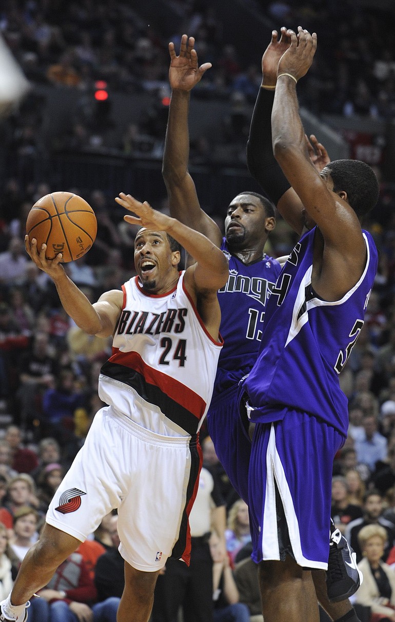 Greg Wahl-Stephens/The Associated Press
Portland's Andre Miller (24) has taken over point guard duties.