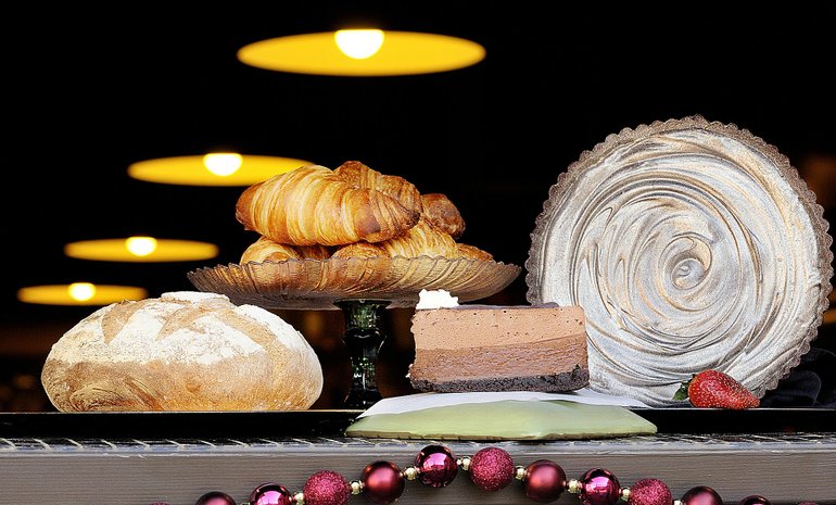 Troy Wayrynen/The Columbian
Je T'Aime Bakery's selection includes, from left, Rustic Garlic Loaf, Butter Croissants, Chocolate Marble Mousse Layer Cake and Bittersweet Chocolate Gorgonzola Dolce Torte.