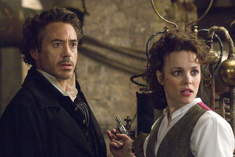 ROBERT DOWNEY JR. as Sherlock Holmes and RACHEL McADAMS as Irene Adler in Warner Bros. Pictures? and Village Roadshow Pictures? action-adventure mystery &quot;Sherlock Holmes,O distributed by Warner Bros.