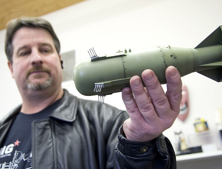 Masterpiece Models owner John Geigle holds up a 1/12th scale model of Little Boy, the atomic bomb dropped on Hiroshima, Japan, by the United States on August 6, 1945.