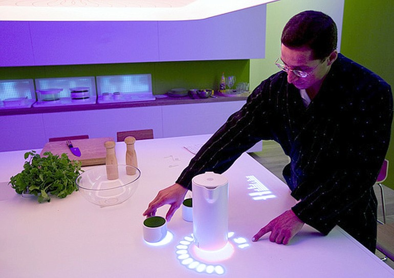 Philips 
The &quot;Interactive Kitchen Table&quot; has a table-op interface, where all the action takes place and moonlights as both a dinner table and a cooking top.