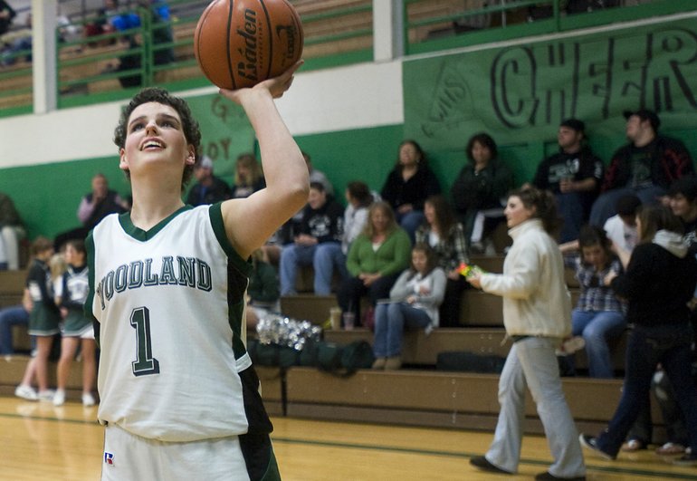 After losing her arm to cancer last year, MaryKate Hughes didn't want to make the Woodland junior varsity basketball team out of pity.
