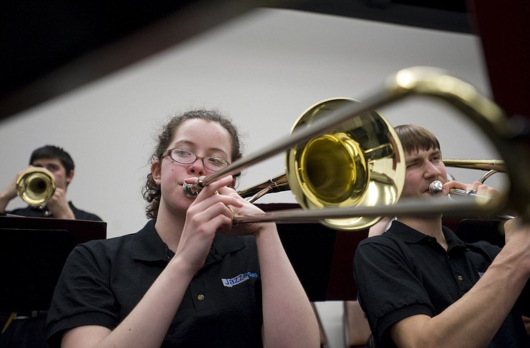 Clark College Jazz Ensemble trombonists Hannah Smith, left, and Grant Carson practice for the Clark College Jazz Festival.