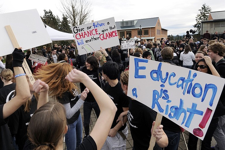 Hundreds of Washington State University Vancouver students and some faculty came together for a rally in protest of recent changes in state funding for higher education at the Salmon Creek campus Thursday.