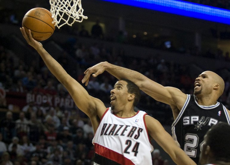 Zachary Kaufman/The Columbian
The Trail Blazers' Andre Miller drives past the Spurs' Richard Jefferson to the basket in the first half of Portland's win over San Antonio.