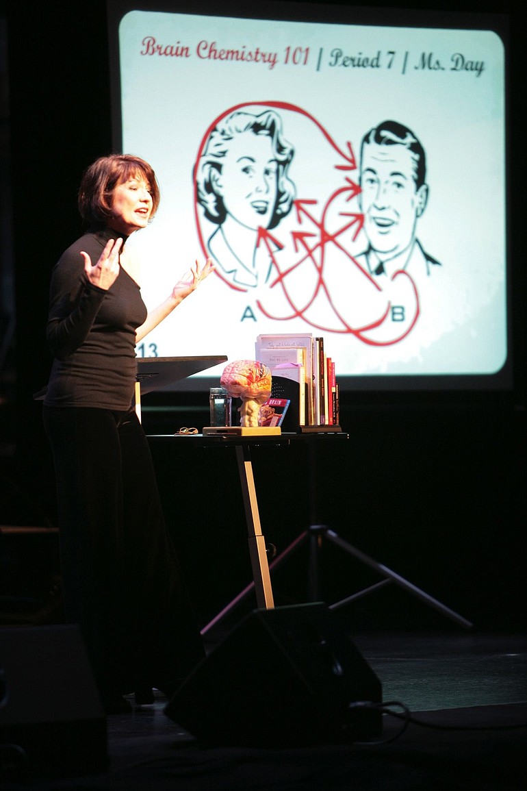 Singer Valerie Day uses a video to help explain how love affects the brain during last year's &quot;Brain Chemistry for Lovers.&quot; The show will be reprised Tuesday as part of the Oregon Museum of Science and Industry's Science Pub program.