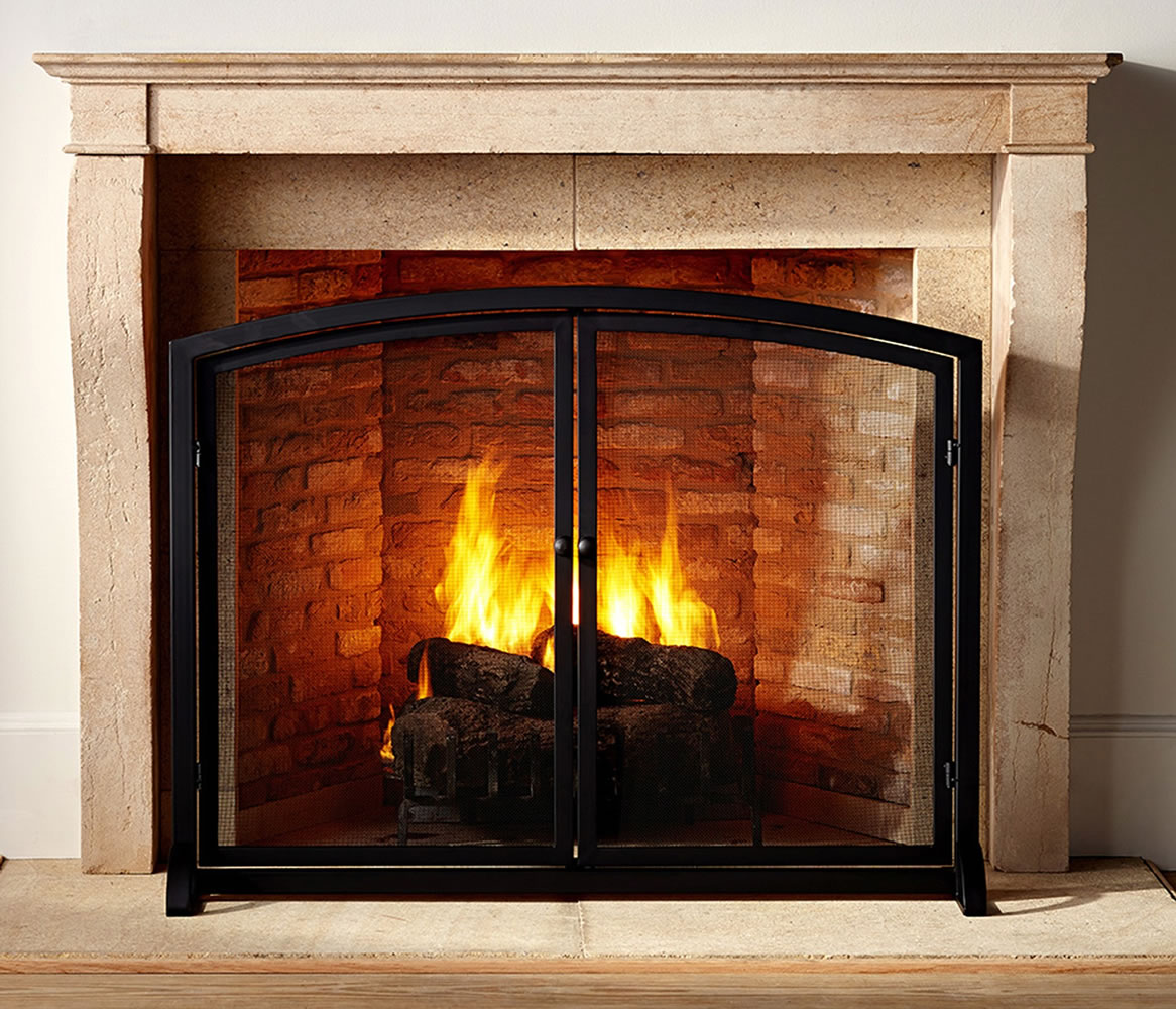 If you make fires often, Miles Elliot, product manager for wood-burning products at Plow &amp; Hearth, recommends a screen with doors, such as Pottery Barn's Classic Fireplace Single Screen.