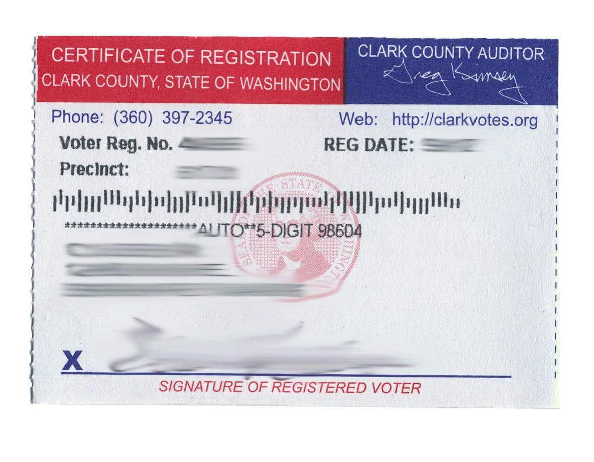 A Clark County voter card, with identifying information obscured.