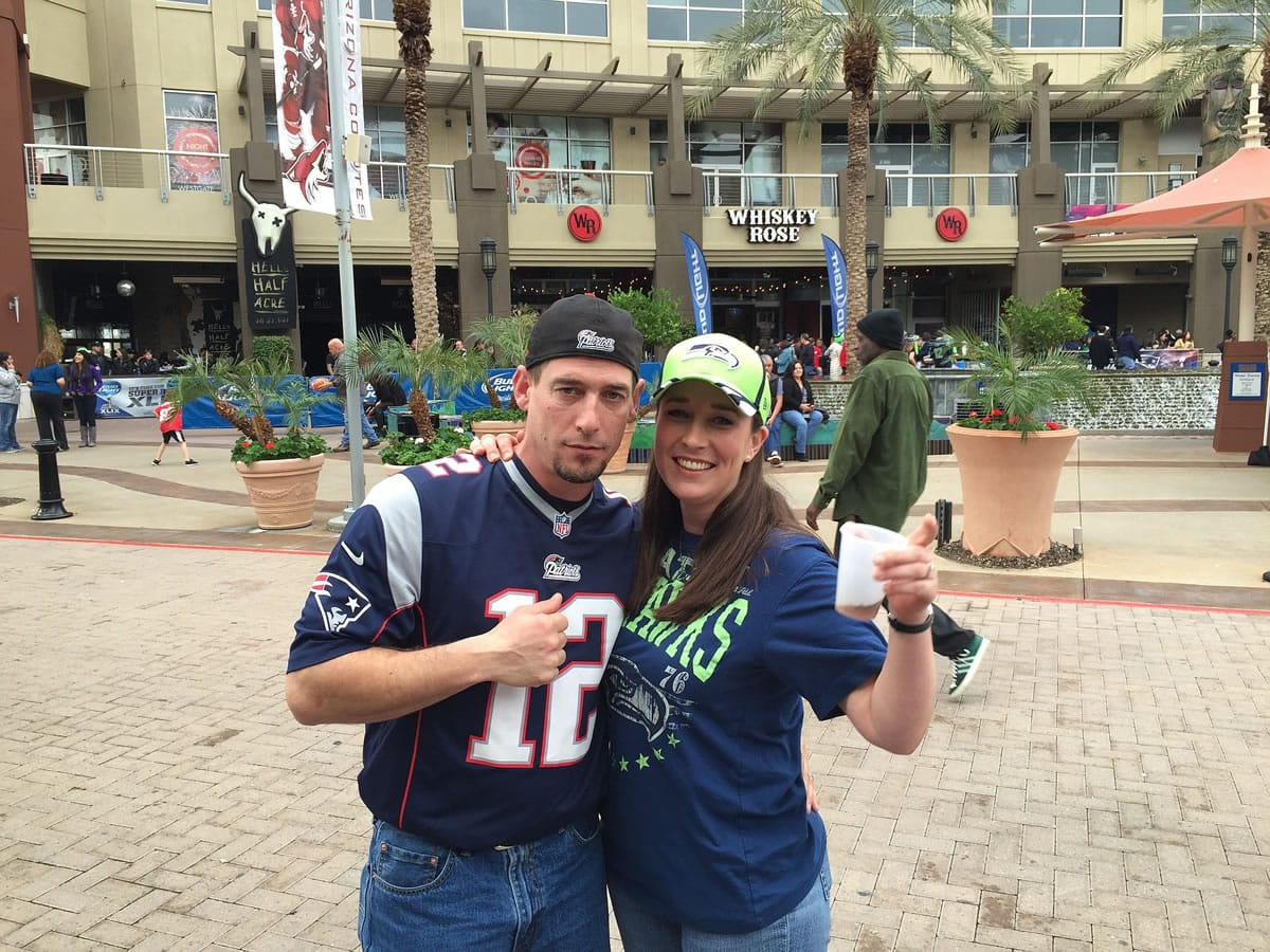 These two fans of the opposing Super Bowl teams said they have been together for four years.