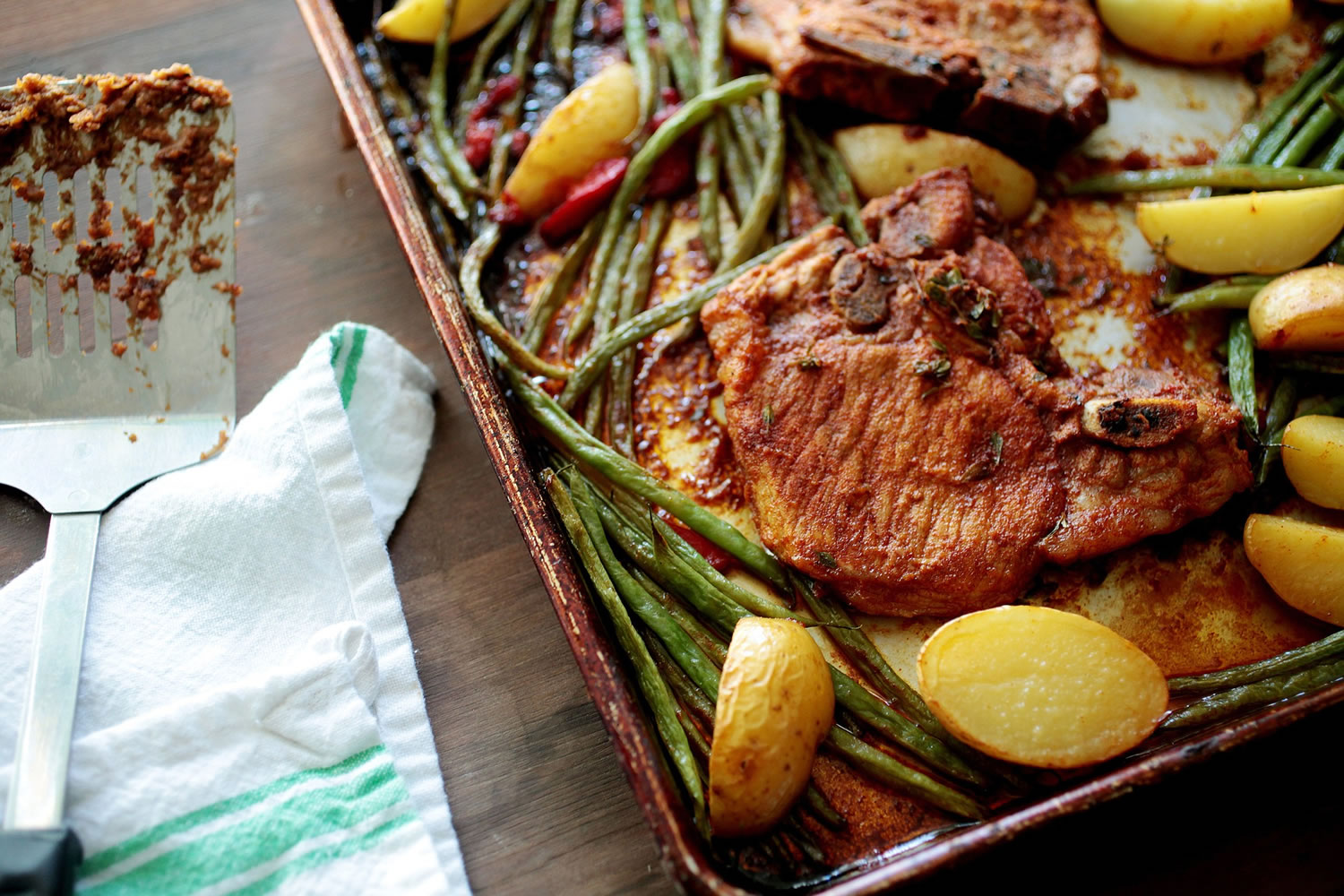 The Roasted Pork Chops with Green Beans and Potatoes takes 25 minutes to cook.