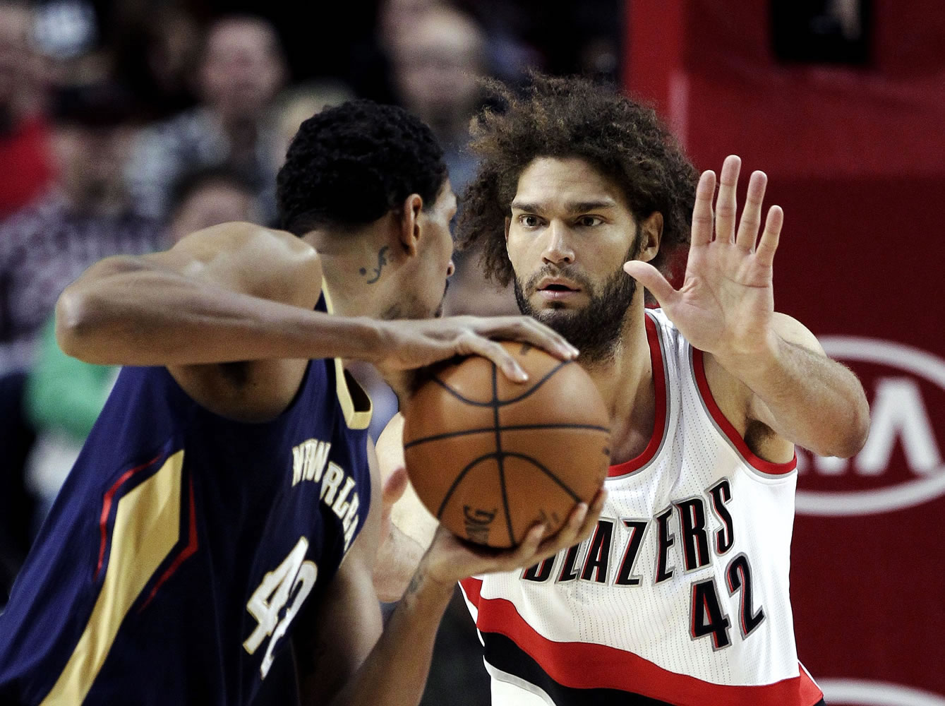 Portland Trail Blazers center Robin Lopez, right, is expected back in the Blazers' lineup against the Utah Jazz on Tuesday, Feb. 3, 2015. He has been out since Dec. 15 with a broken hand.