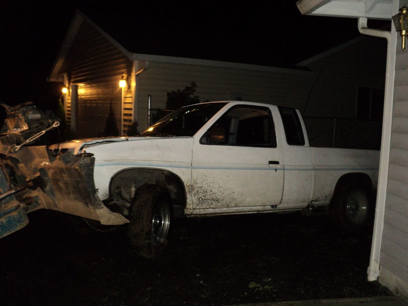 Battle Ground police say this white Nissan truck was reported stolen out of Oregon before it hit vehicles and damaged property in Battle Ground.
