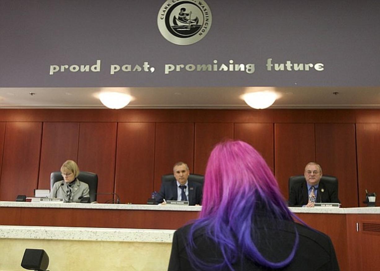 Kimberly Abell of Camas speaks to the Clark County Council  in Vancouver in February 2015 about a motion to display &quot;In God We Trust&quot; in the public hearing room.