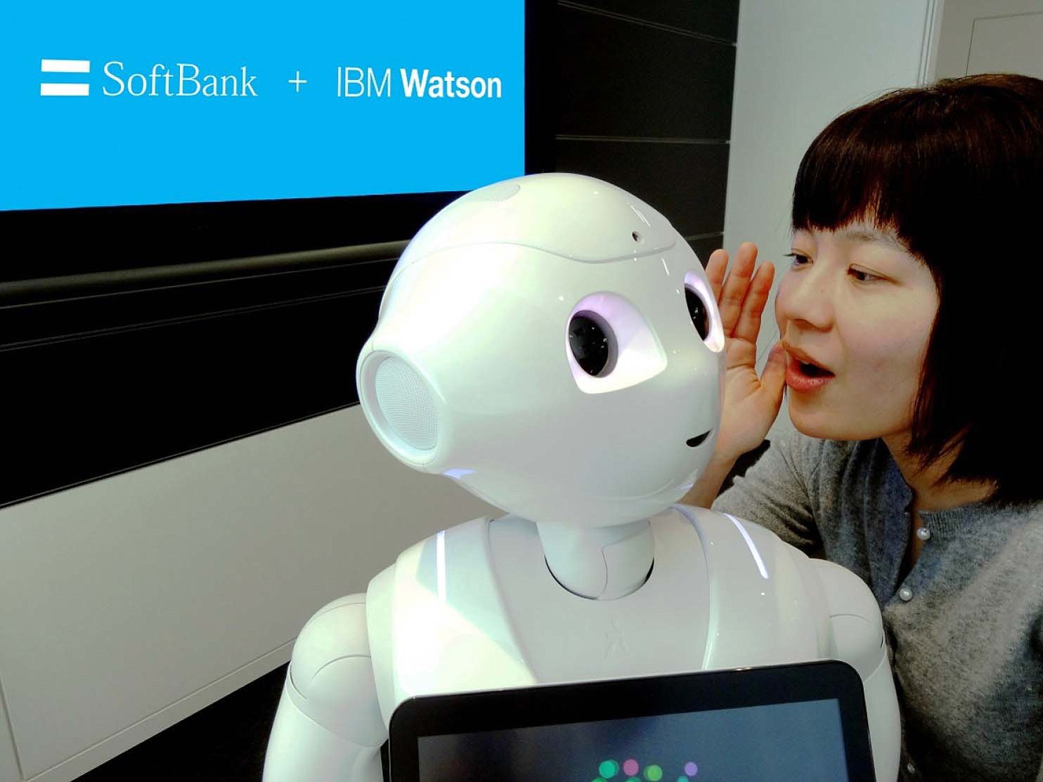 IBM
IBM Researcher Risa Nishiyama demonstrates SoftBank's Pepper robot, which uses the Watson computer. Watson, best known for winning a &quot;Jeopardy!&quot; match in 2011, is designed to take in huge amounts of information, process and learn from them in the same way the human brain does. Researchers now are working to teach Watson Japanese.