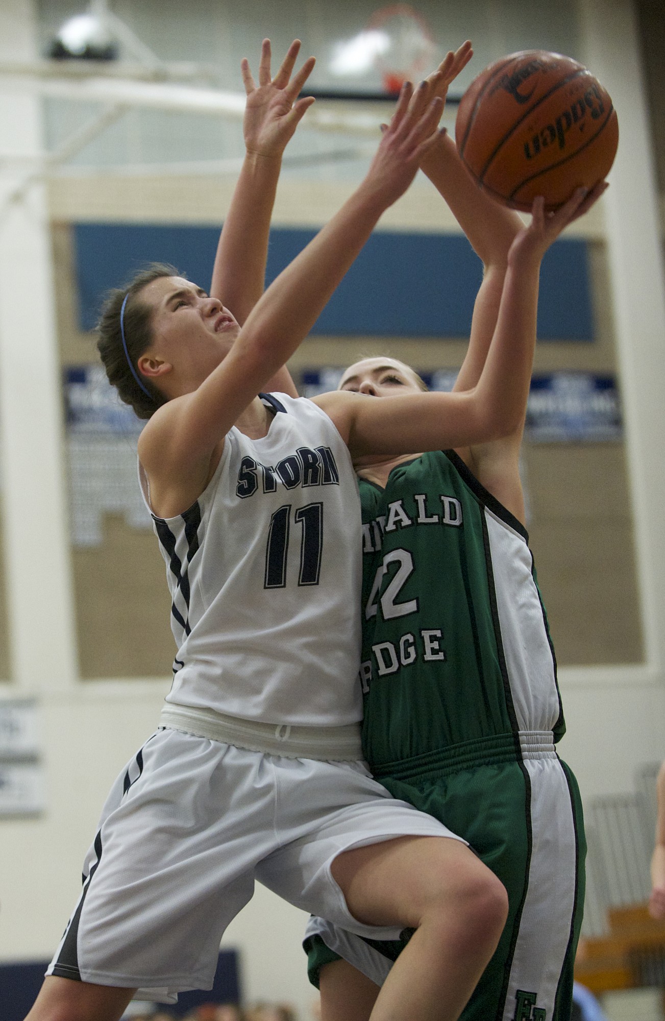 Skyview's Genevieve Lo, 11, drives to the basket against Emerald Ridge in the 4A girls bi-district playoff game at Skyview High School, Thursday, February 13, 2014.