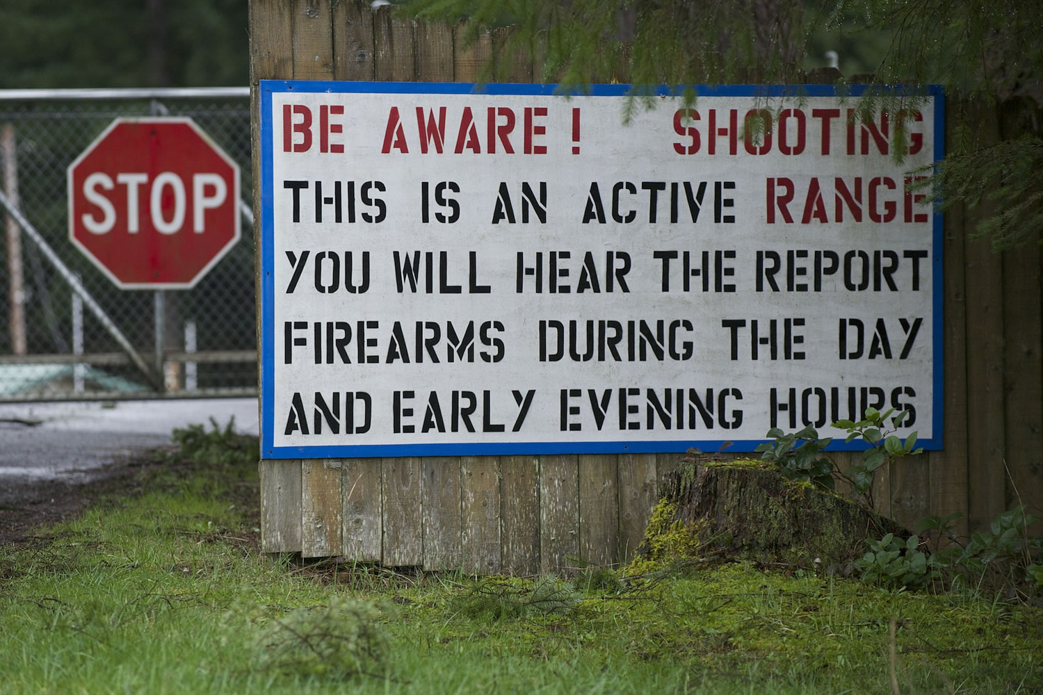 A sign outside the Clark Rifles shooting range warns about noise coming from the range.