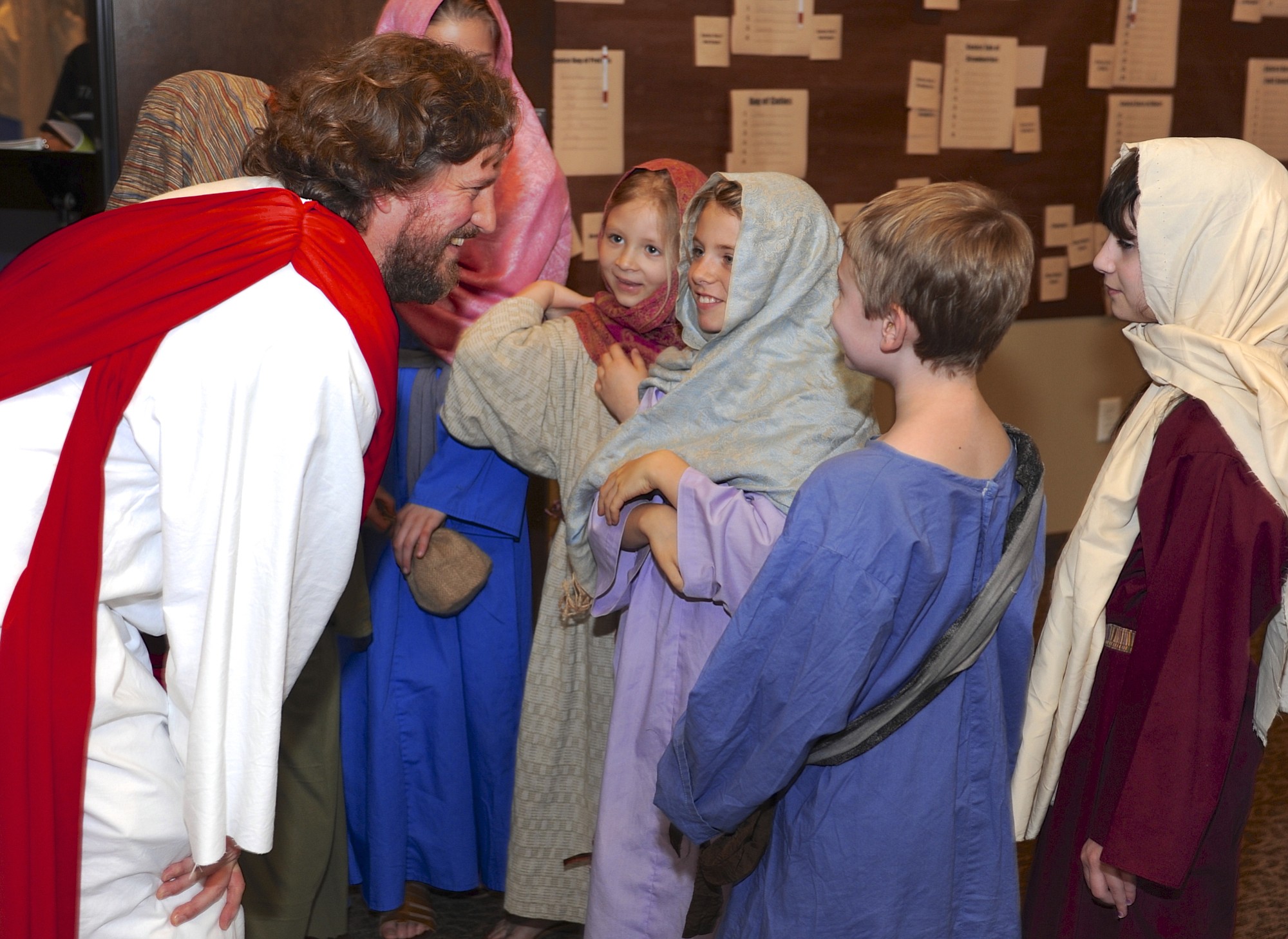 Mark Dahl, who plays Jesus in &quot;Bow the Knee,&quot; visits with some of the children in the musical during a dress rehearsal Sunday at Liberty Bible Church of the Nazarene in Salmon Creek.