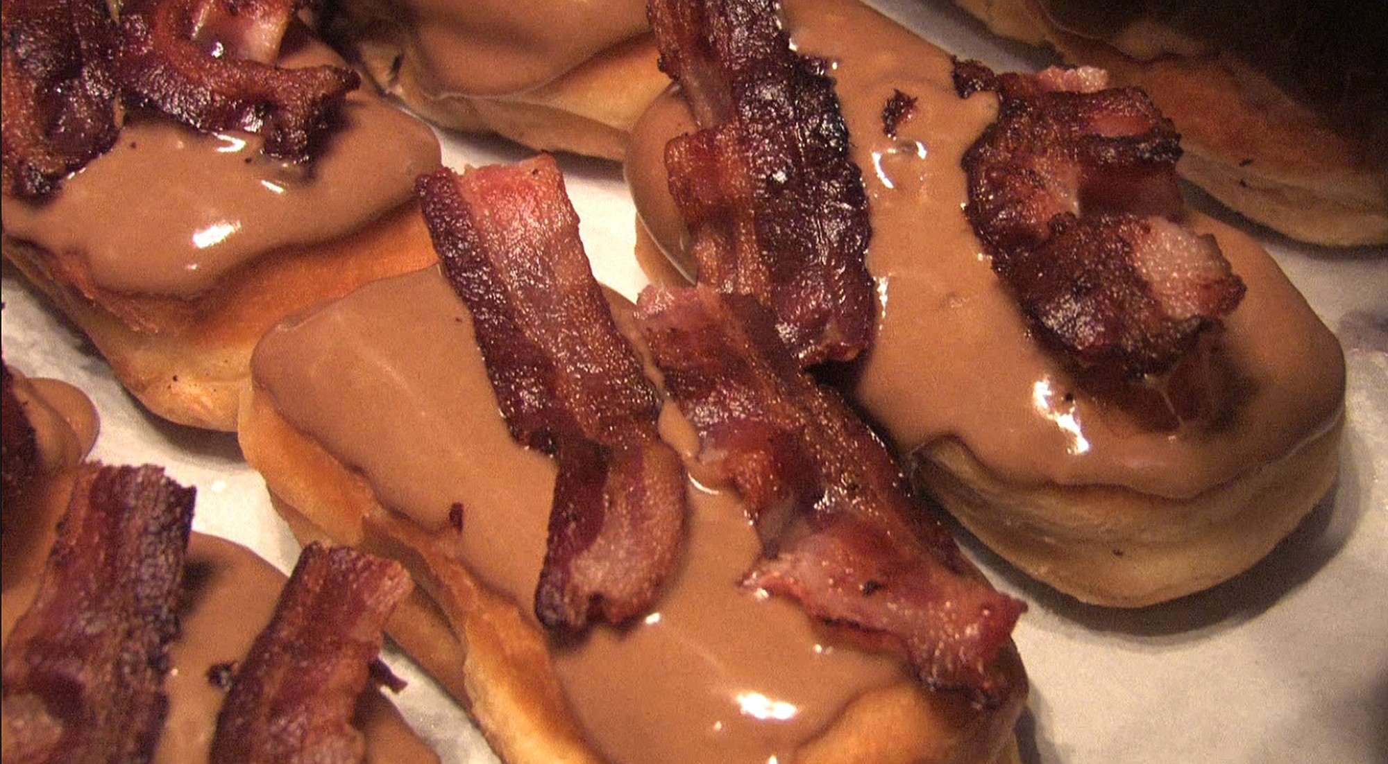 Rick Bowmer/Associated Press files
Bacon Maple Bars are shown at Voodoo Doughnut in Portland. The Portland doughnut chain has opened a fifth shop in Austin, Texas.
