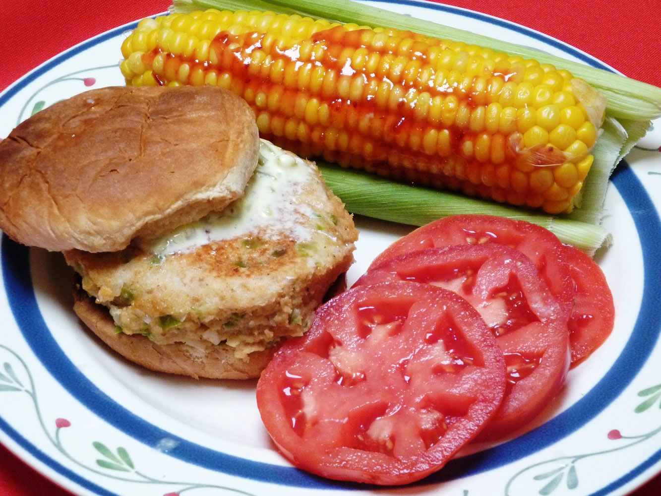Salmon burgers with hot pepper corn.