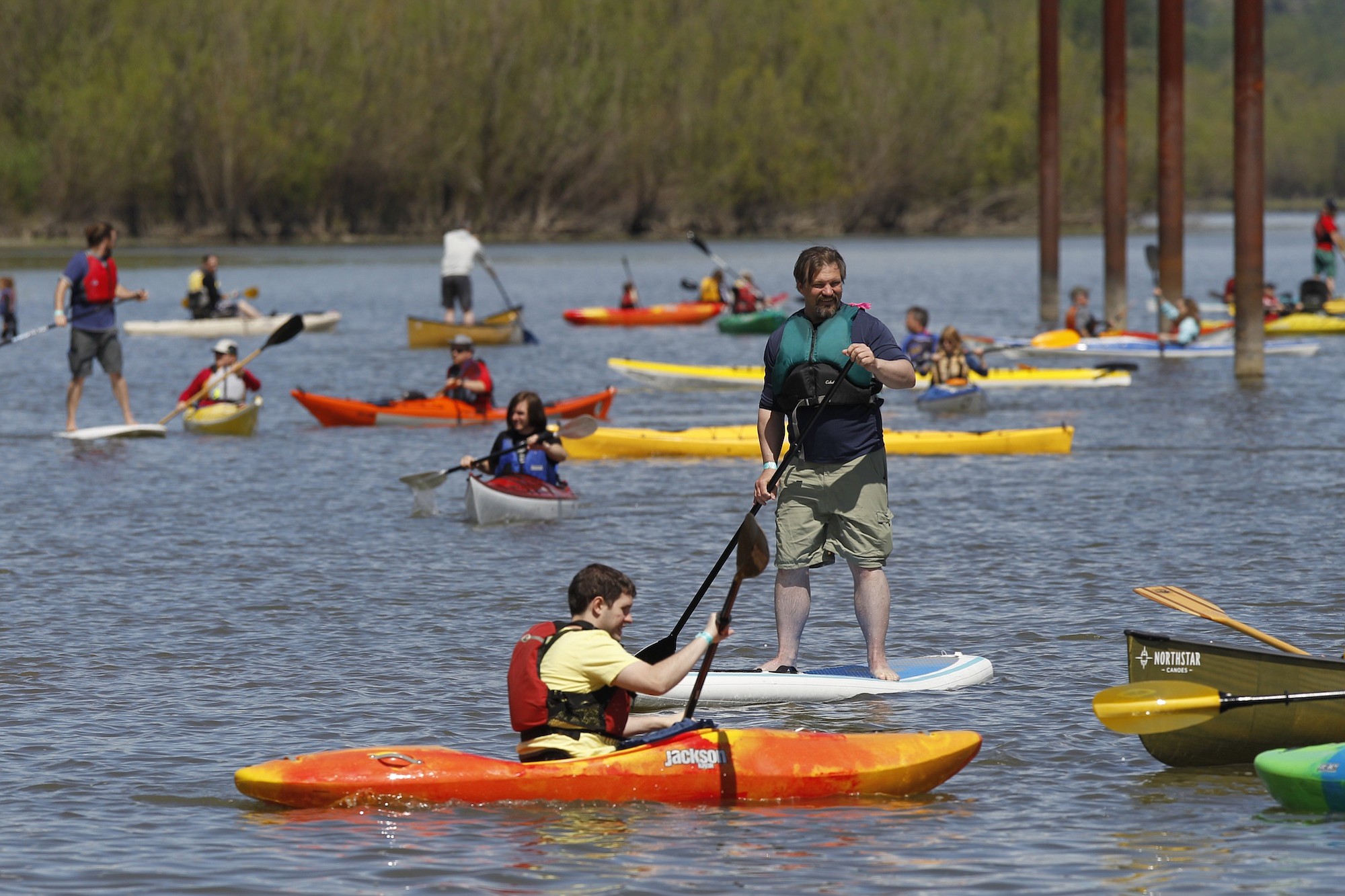People test out kayaks and stand-up paddle boards during April's Paddlefest at Vancouver Lake Regional Park.