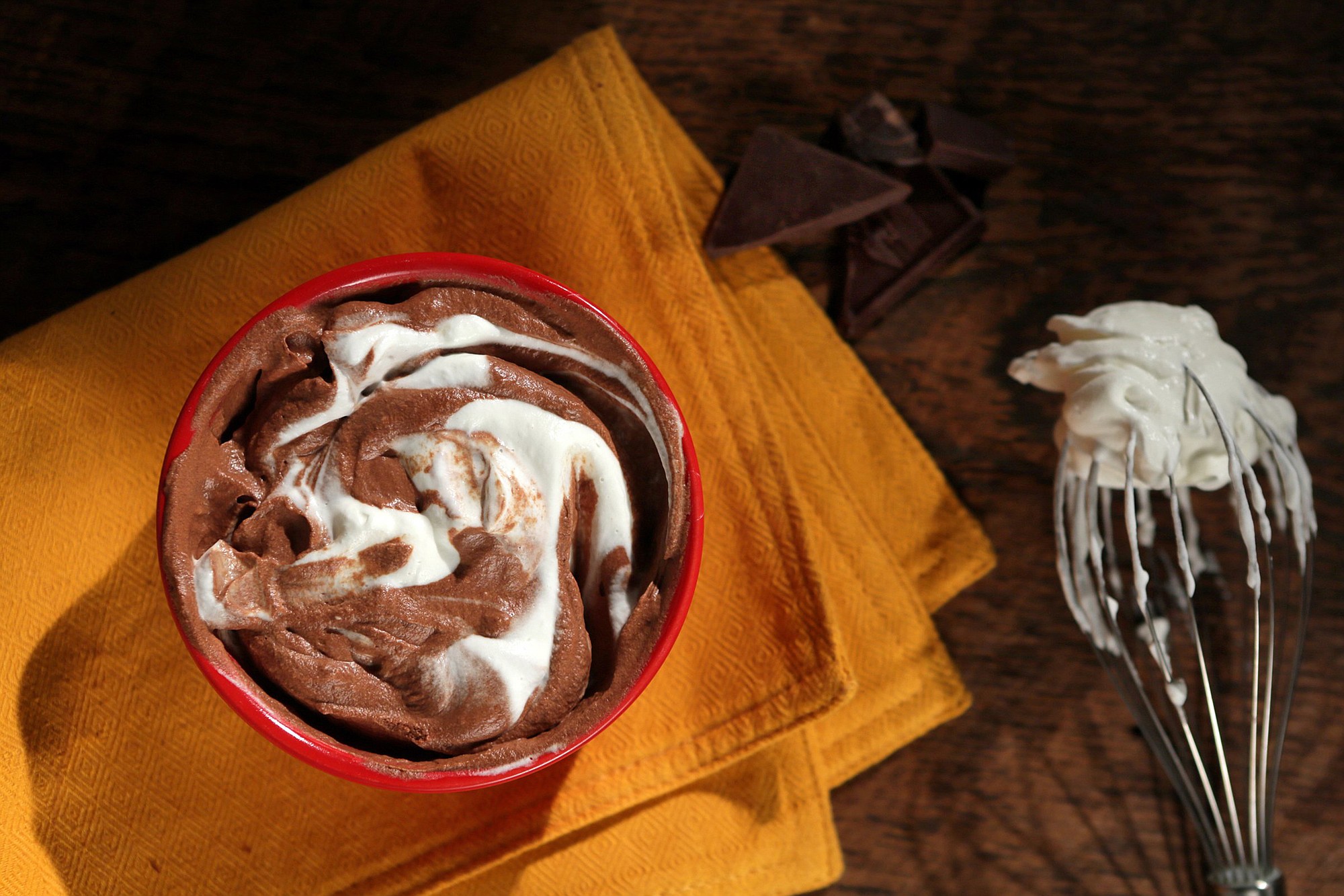 Chocolate mousse swirled with whipped cream.