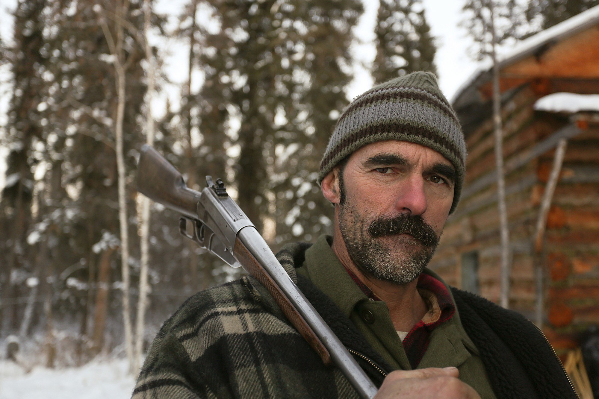 Animal Planet
Ray Lewis, with the rifle he hopes will bring down an animal big enough to sustain his family through the harsh Arctic winter, appears on a new reality show, &quot;The Last Alaskans.&quot;