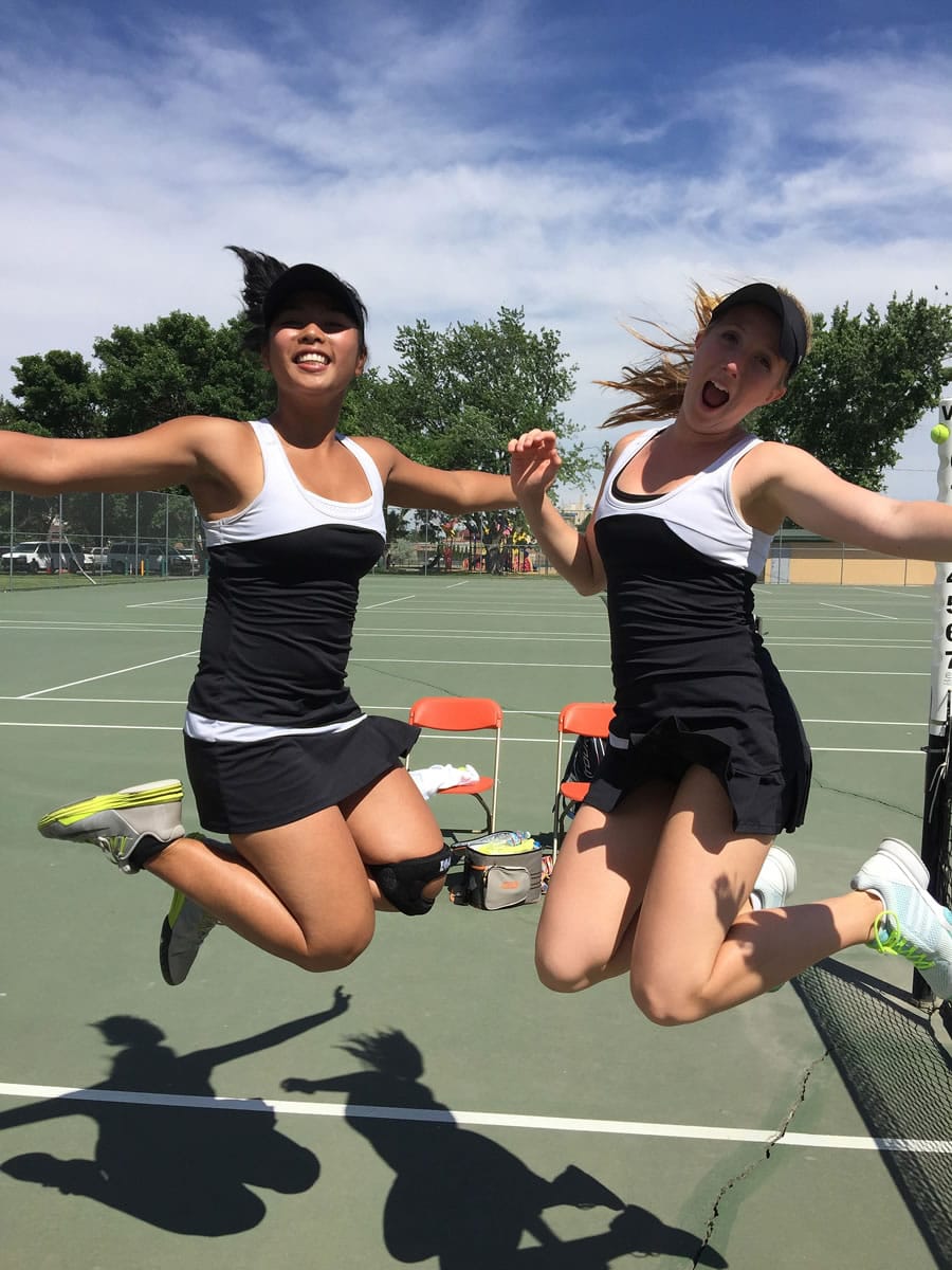 Camas sophomore Hannah Gianan, left, and senior Jenn Lewis, after winning their second consecutive Class 4A state girls doubles title. (Photo courtesy of Dr.