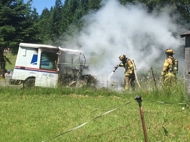 Clark County Fire &amp; Rescue firefighters extinguish a vehicle fire in north Clark County.