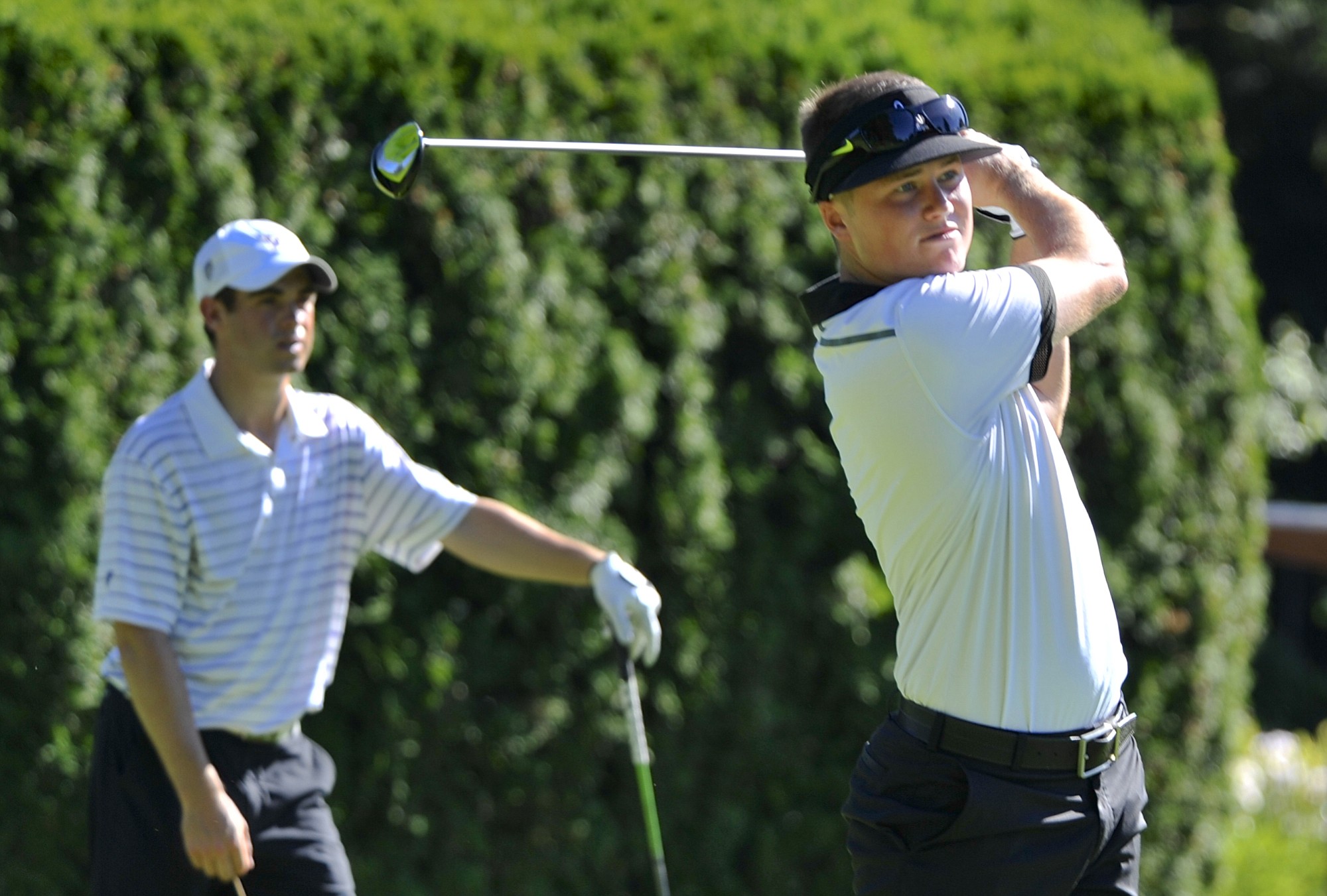 Nigel Lett, right, rebounded from back-to-back double bogeys to record pars on the final three holes and win the Royal Oaks Invitational Tournament.
