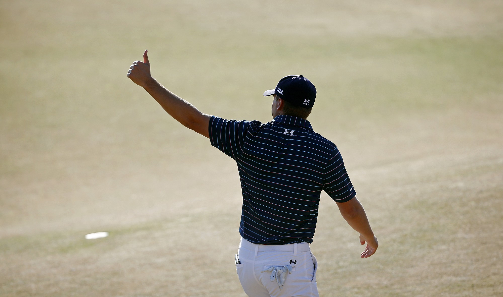 Jordan Spieth walks off the green after the final round of the U.S. Open golf tournament at Chambers Bay on Sunday, June 21, 2015 in University Place, Wash. Spieth won the championship.