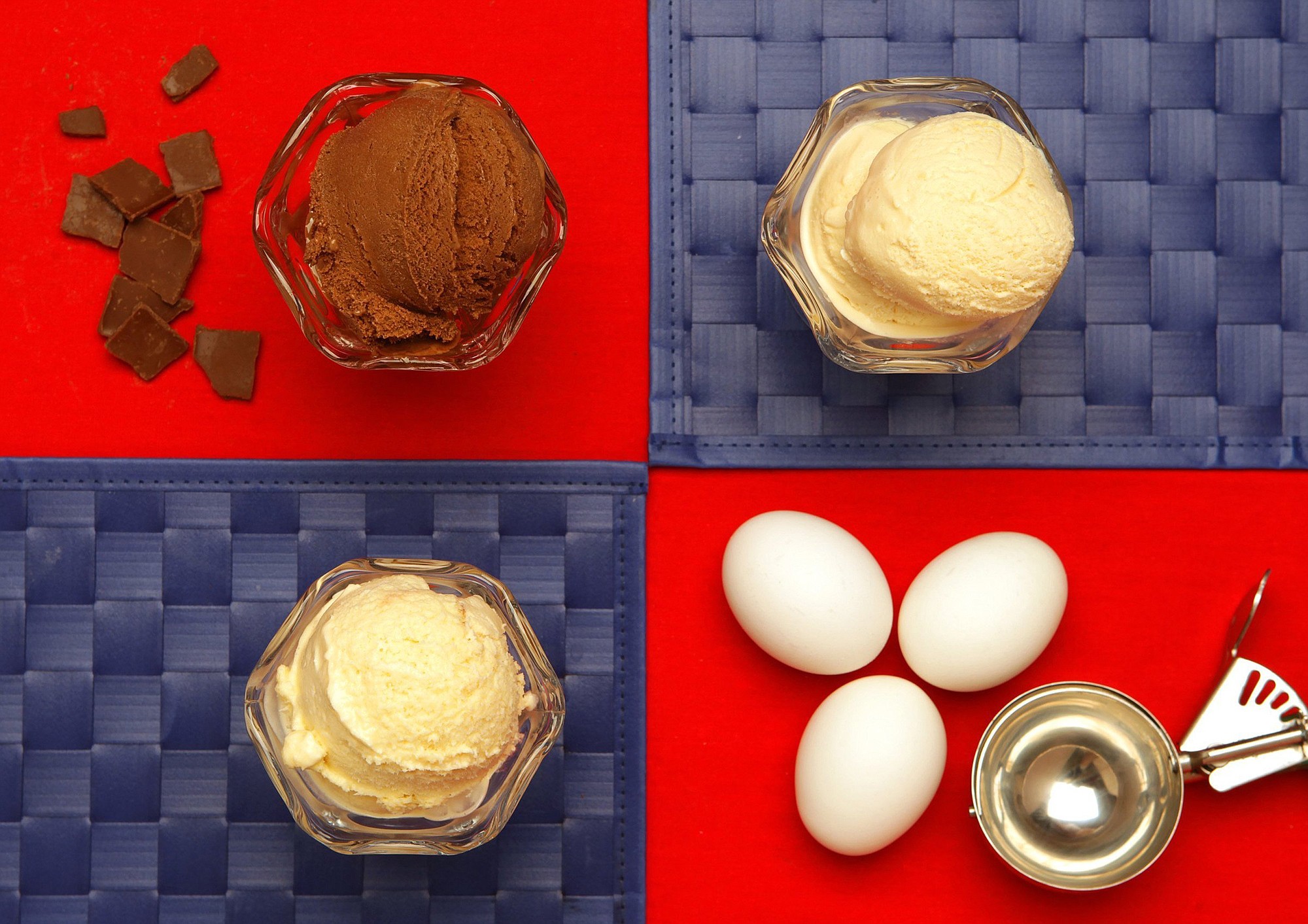 A sampling of homemade ice cream that includes, clockwise from top left, Glace au Chocolat, Salty Caramel, White Chocolate.