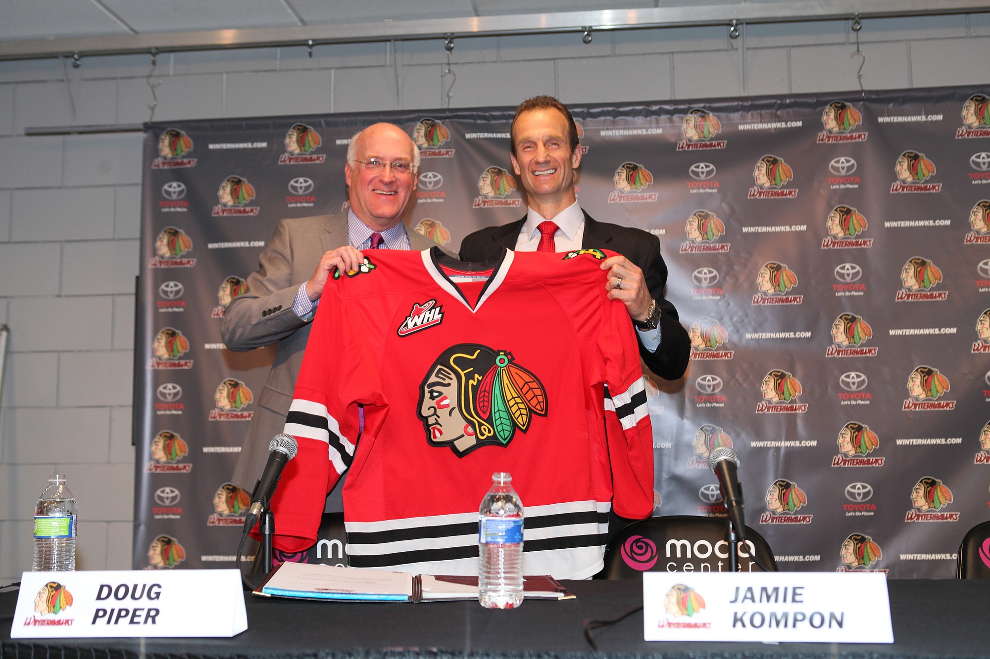 Portland Winterhawks head coach/general manager Jamie Kompon, right, with team president Doug Piper as the team introduced Kompon to his new position on Wednesday, July 9.
