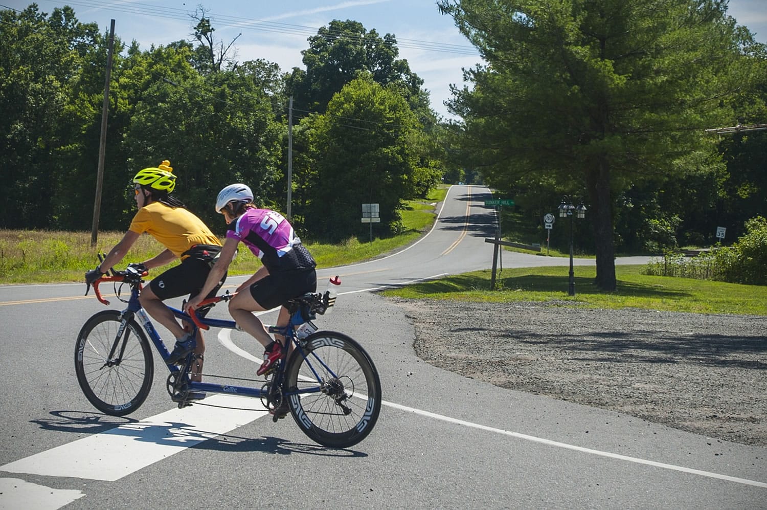 Kevin Streeter guides Kristina Ament during a training ride in The Plains, Va.