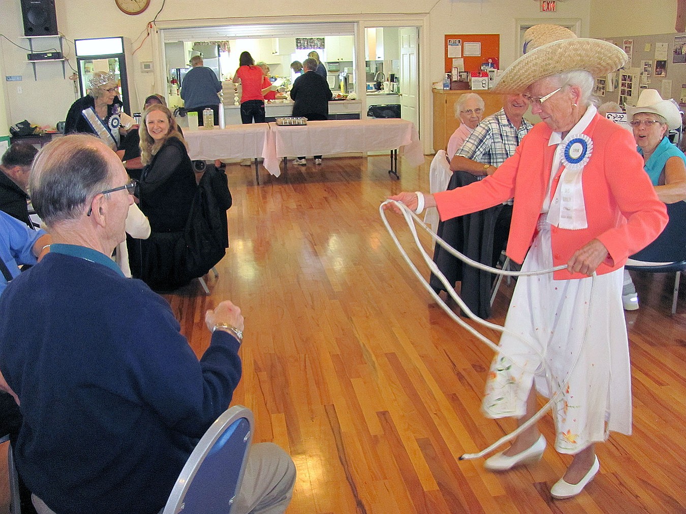 Virginia Warren demonstrated her roping skills at a luncheon for current and former Camas Days Royalty. Warren sat at a table with a Western theme. Other themes included the beach, Mt. St.