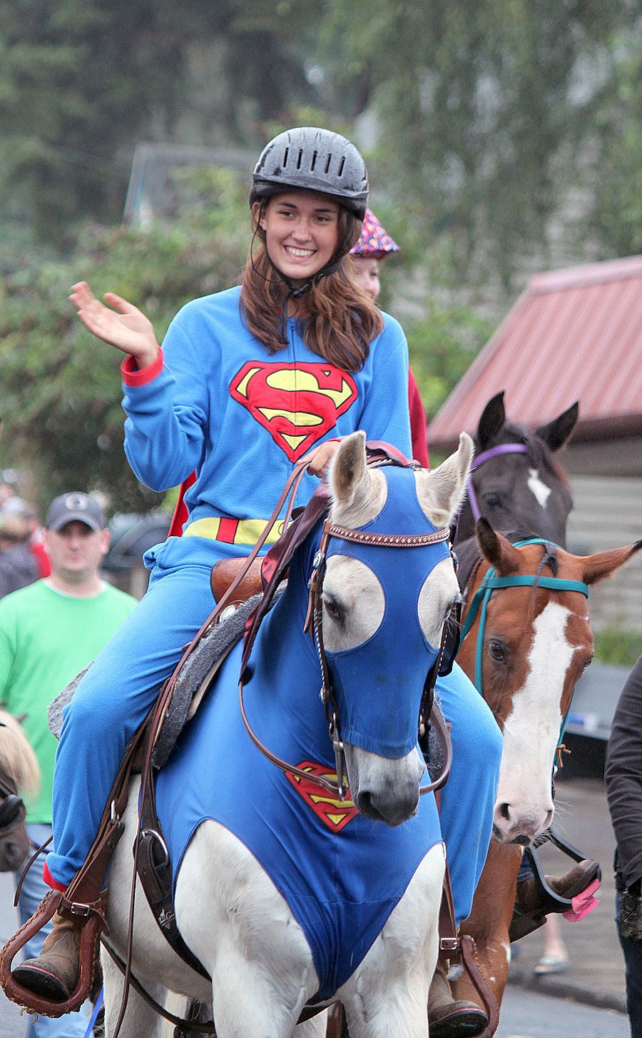 The super hero duo of Faith Chertudi and Boone, an Arab rescue horse, brought smiles to the faces of the crowd at the Camas Days Grand Parade.