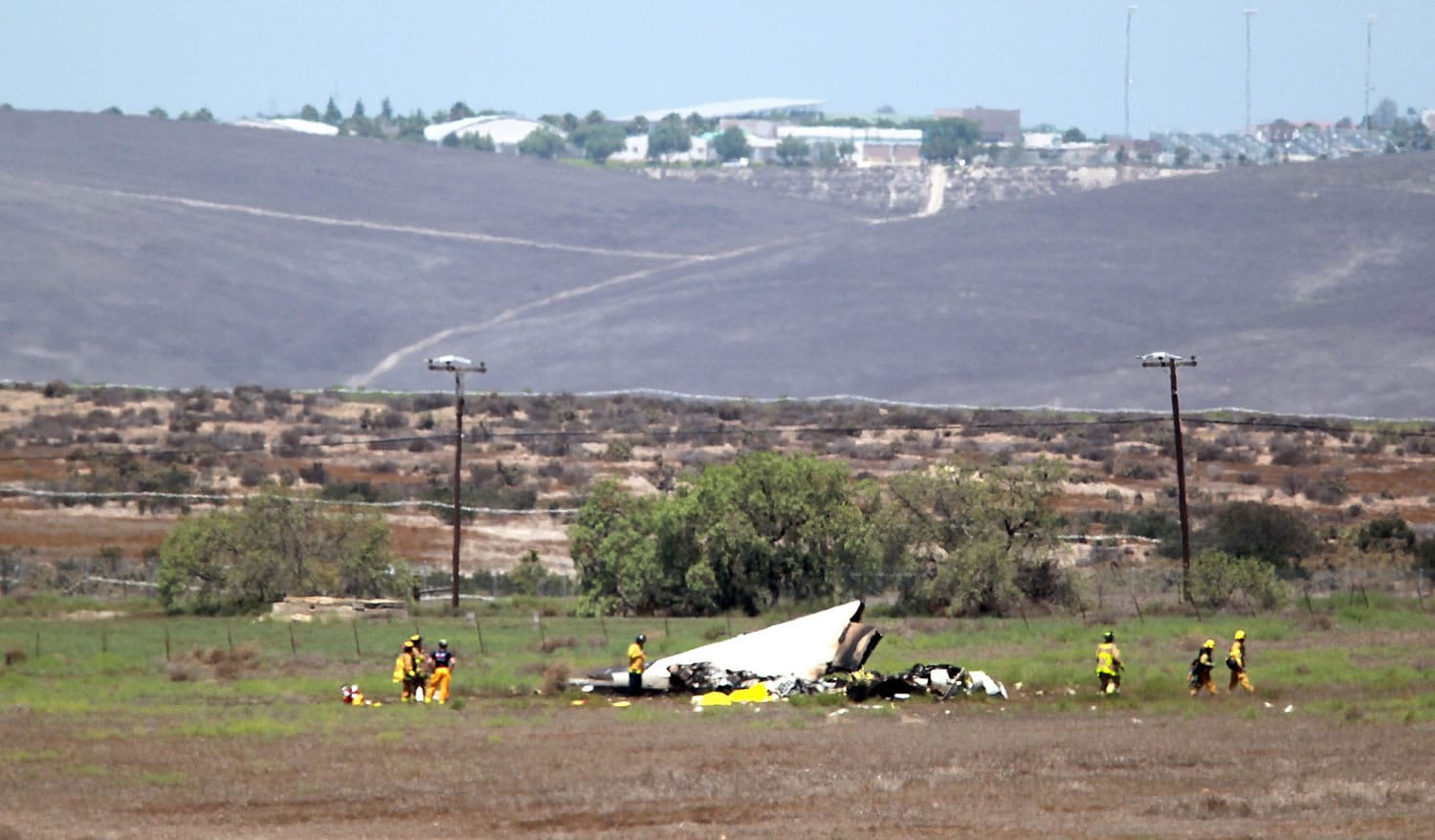 Authorities say four people died Sunday following the mid-air collision of two small planes near an airport in southern San Diego County.