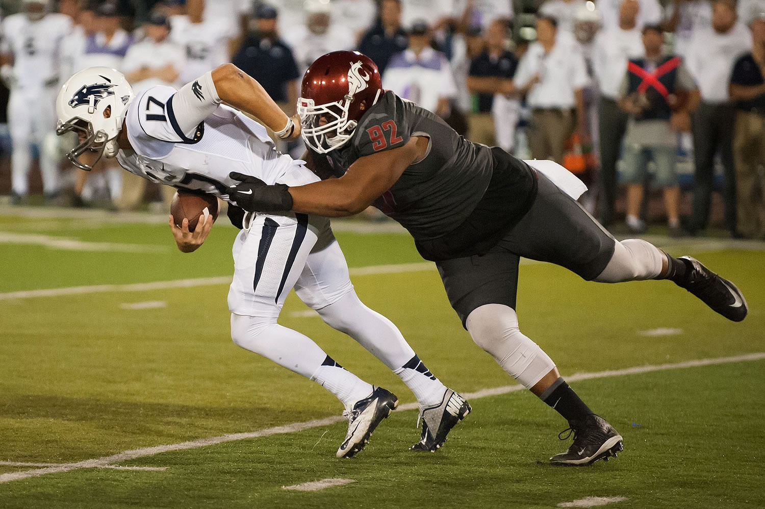 Associated Press files
Washington State junior nose tackle Robert Barber brings experience to the Cougars' defense.