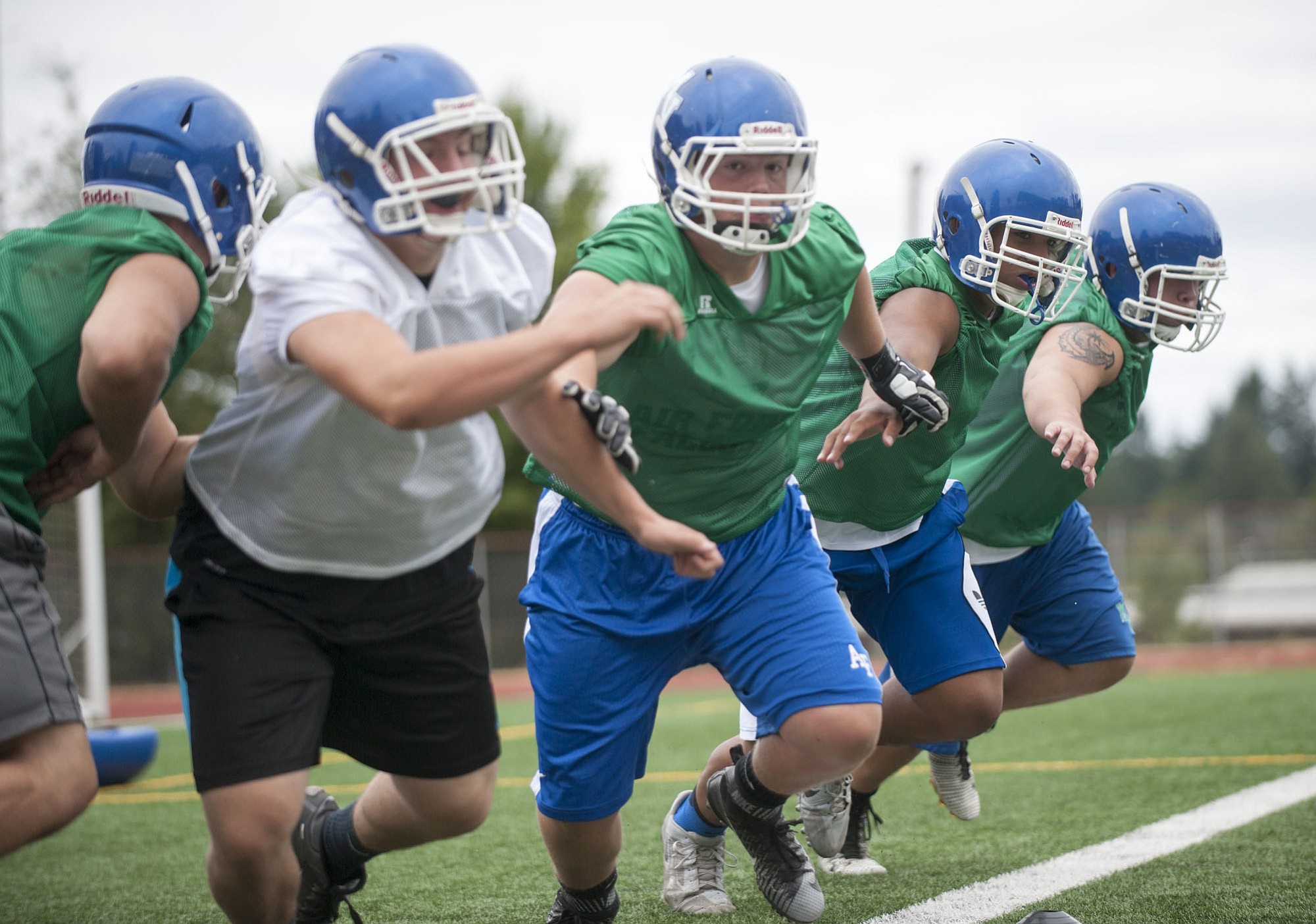 From left in blue shorts, Chris Mitchell, Isaiah Carbajal, and Ethan Tonder bring experience to the offensive line at Mountain View.