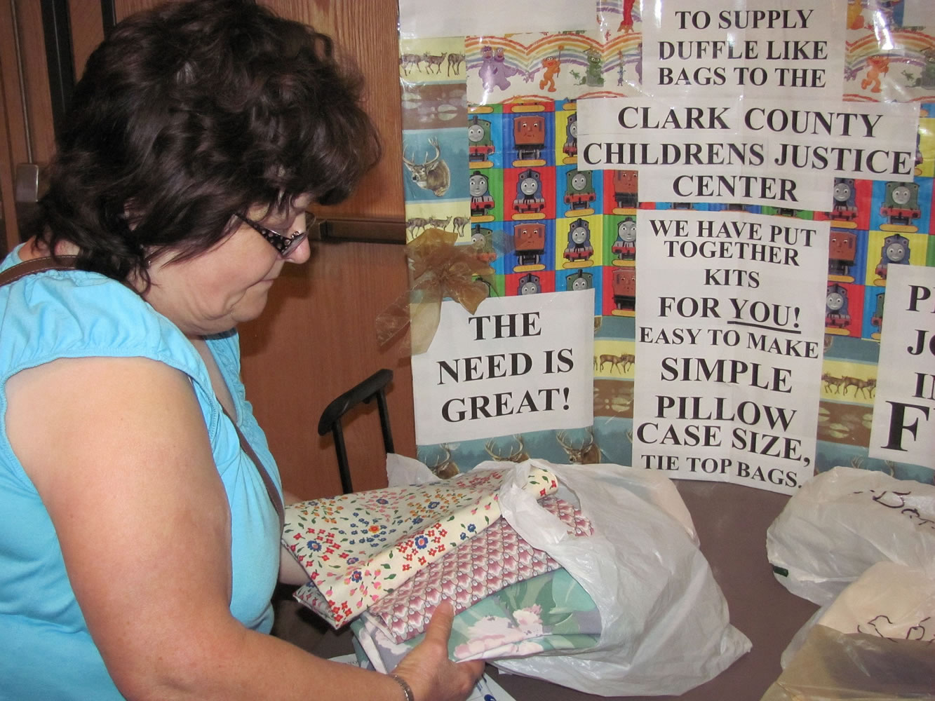 Marilyn Price (pictured) and Georgia Hockett are part of the &quot;Baggettes&quot; group at the Clark County Quilters Guild. They make cloth bags and baby quilts for the Children's Justice Center in Vancouver. &quot;When children are removed from a home, they often have to put their belongings in a plastic bag,&quot; Price said.