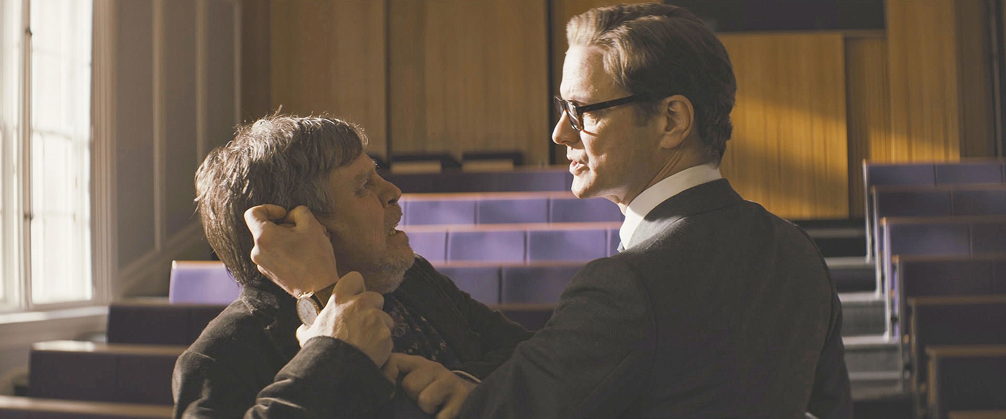 Colin Firth has Mark Hamill by the ear in &quot;Kingsman: The Secret Service.&quot;