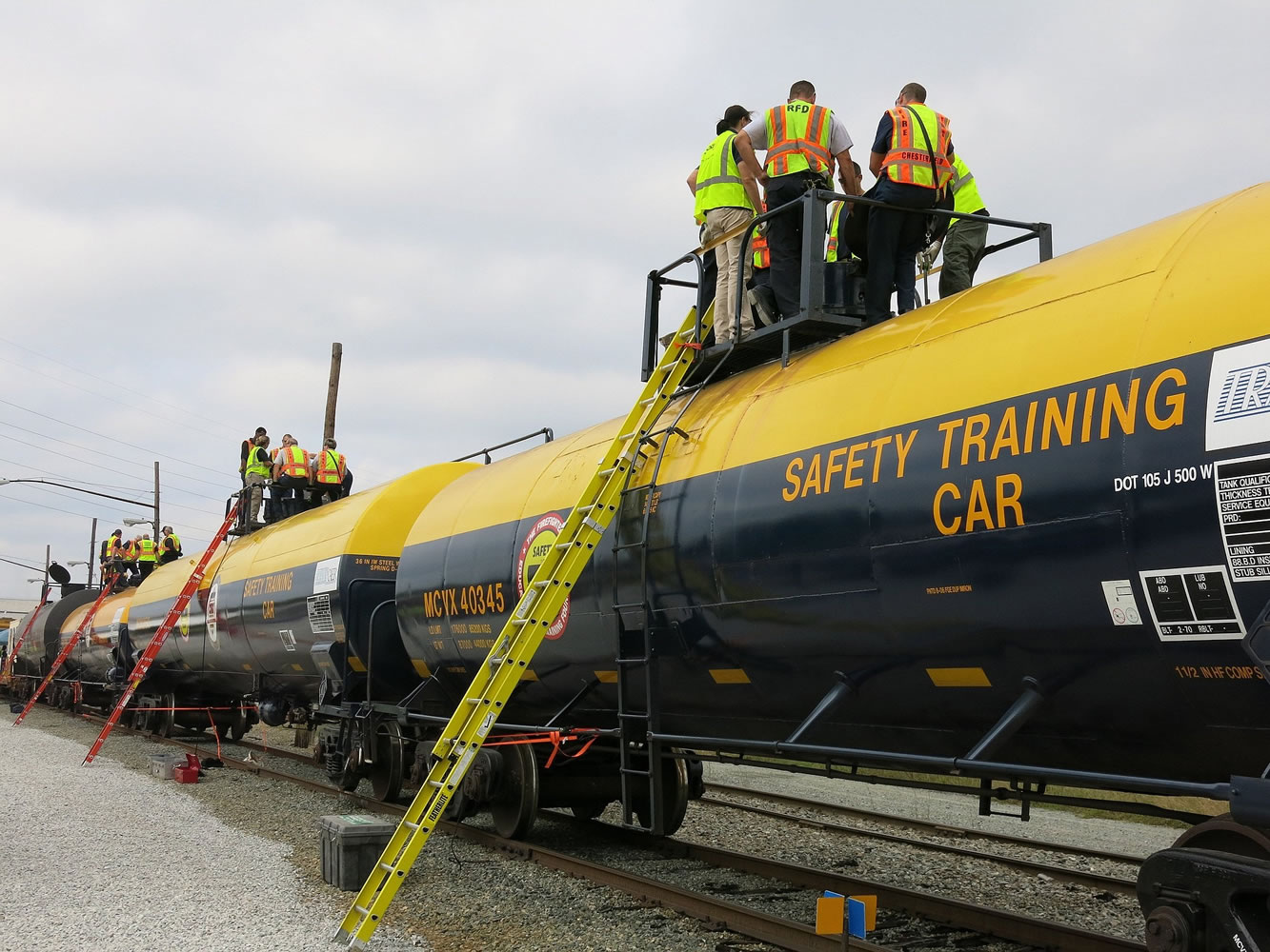 Virginia emergency responders learn about the types of railroad tank cars in a safety class Monday at a CSX yard in Richmond, Va. About 66 first responders, including firefighters, participated in the daylong event.