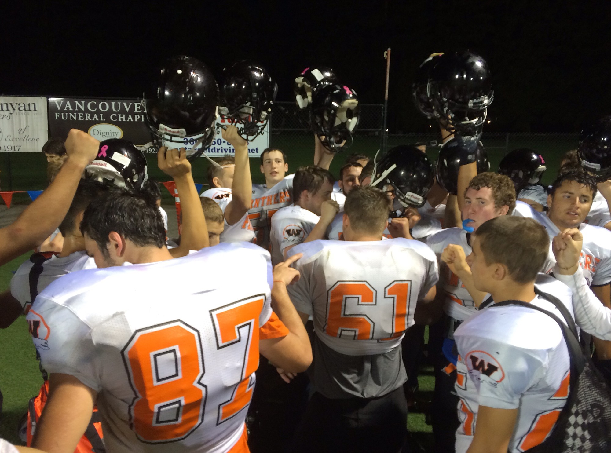 Washougal football players celebrate their 48-6 victory over Hudson's Bay on Friday, Oct.
