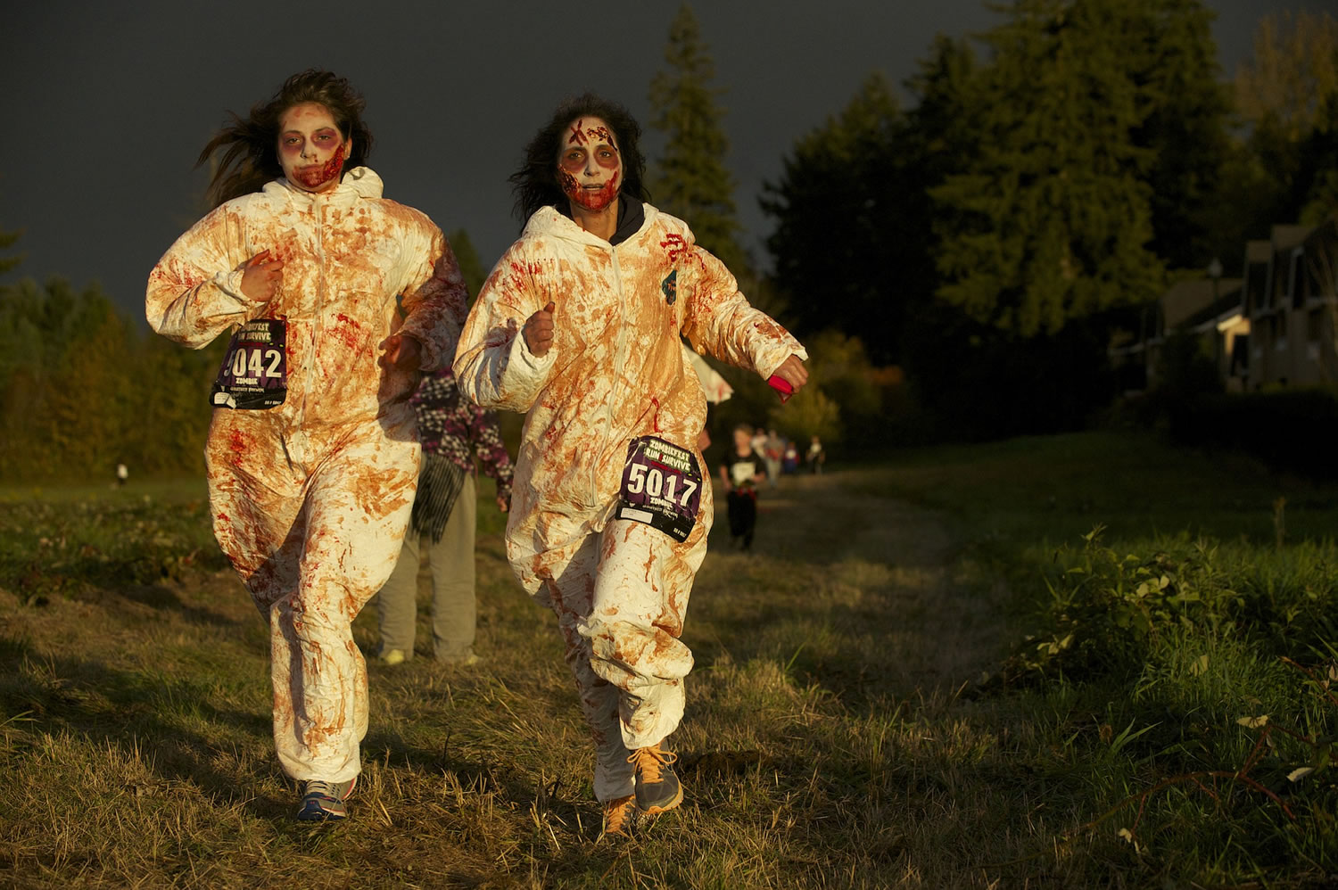 Racine Robson, 14, left, and her mom Kristina Forsberg, both from Vancouver, run in the Run2Survive fun run in 2013.